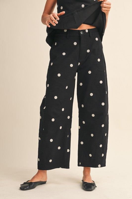 Polka Dot Peplum Top in Black